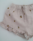 Ljusrosa baby shorts med päron från The New Society